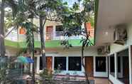 Bangunan 5 Global Inn Syariah Mitra RedDoorz near Juanda T1 Airport