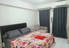 Bedroom 2 Velito at Podomoro Golf View Apartment