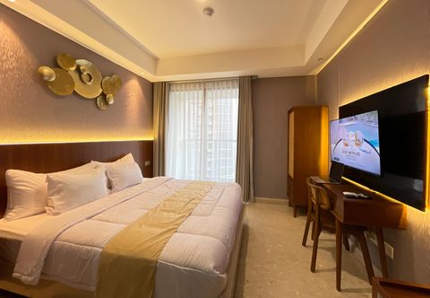 침실 Apartemen Gold Coast PIK Sea View by Cheapinn
