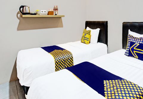 Bedroom SPOT ON 91932 Guest House Mustika Syariah Near alun alun kota purwokerto