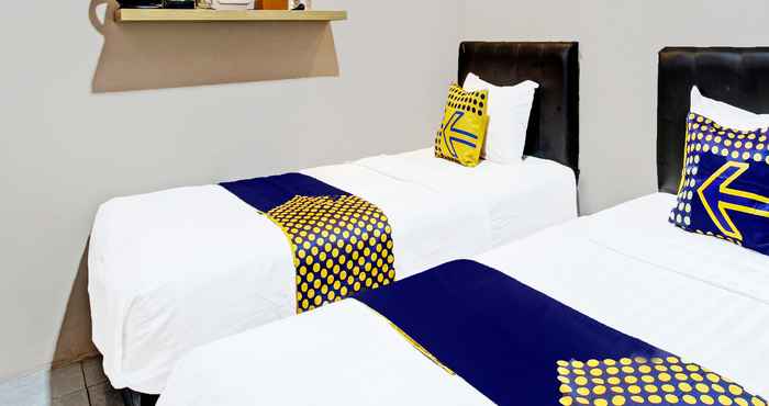 Bedroom SPOT ON 91932 Guest House Mustika Syariah 