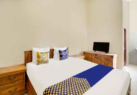 Kamar Tidur SPOT ON 92114 Homestay Riverside Duko