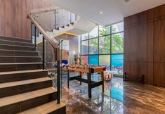 Common Space 6 Sans Hotel Box Mansion Surabaya by RedDoorz