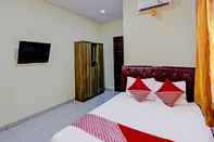 Kamar Tidur OYO 92210 New Town Syariah