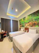 Bilik Tidur 4 Solo Grand City Hotel