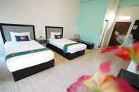 ห้องนอน Roomquest Chonburi Phanat Nikhom