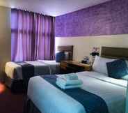 Bedroom 5 Sempre Premier Inn Mactan Airport Hotel