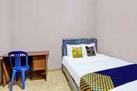 Bedroom SPOT ON 92373 Kristin Homestay 2