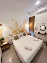 Kamar Tidur 4 Emerald guesthouse type hawai