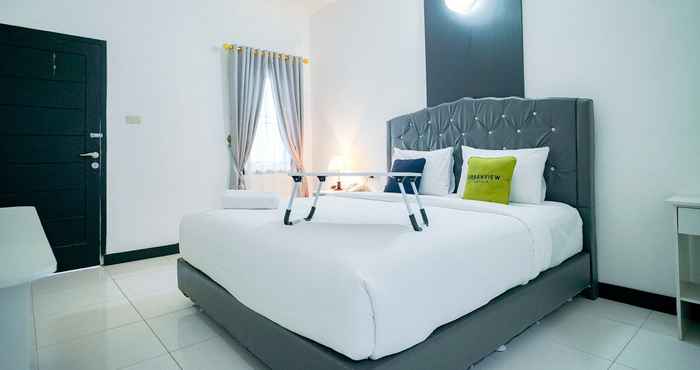 Bilik Tidur Urbanview GHotel Syariah 2 Bandar Lampung by RedDoorz