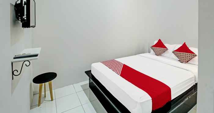 ห้องนอน OYO 92433 Sirih Gading Family Guest House