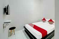 Bedroom OYO 92433 Sirih Gading Family Guest House
