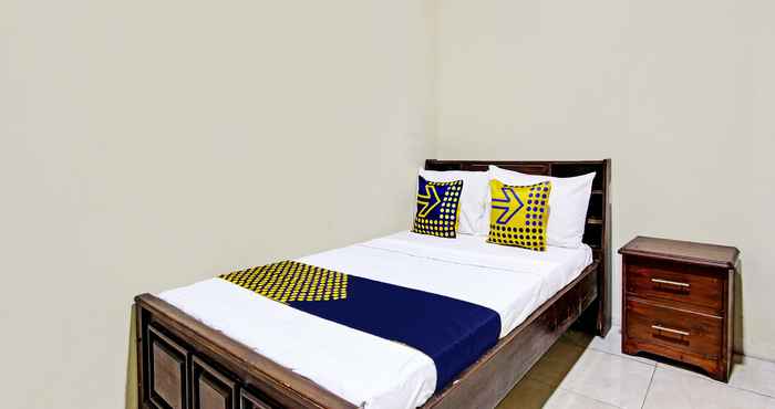 Kamar Tidur SPOT ON 92424 Wulan Homestay Syariah