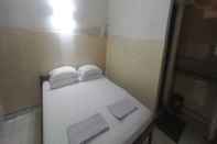 Kamar Tidur SPOT ON 92434 Puri Kasih Guest House Syariah