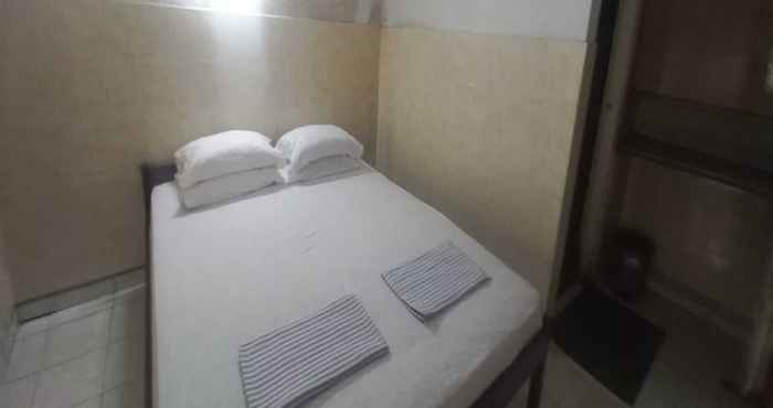 Bedroom SPOT ON 92434 Puri Kasih Guest House Syariah
