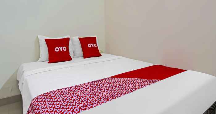 Phòng ngủ Super OYO 92437 Wahidin Guesthouse