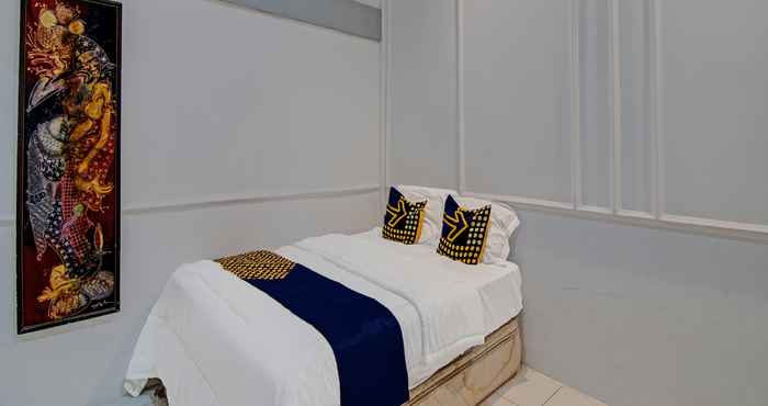 Kamar Tidur SPOT ON 92449 Libersa Homestay Syariah