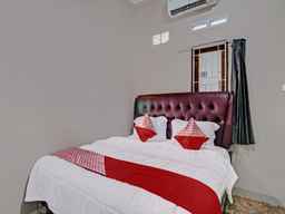 OYO 92456 Putri Homestay Syariah Near SPBU 14.282.694 (Air Hitam), USD 3.97