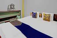 Kamar Tidur SPOT ON 92461 Aini Syariah Homestay 