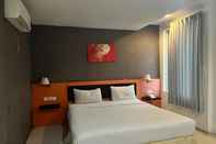 Kamar Tidur OYO 92472 Tri Homestay