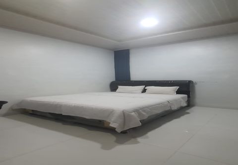Phòng ngủ SPOT ON 92481 Modena Homestay Syariah Near SD Negeri 101798 Deli Tua