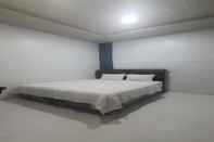 Bedroom SPOT ON 92481 Modena Homestay Syariah