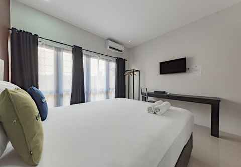 Bedroom Urbanview Hotel Yoga Palangkaraya by RedDoorz