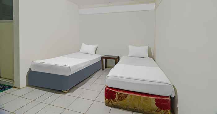 Kamar Tidur OYO 92484 Wisma Permata Syariah