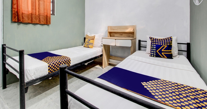 Kamar Tidur SPOT ON 92490 Casa Homestay Syariah