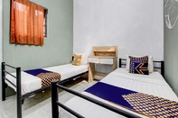 Kamar Tidur SPOT ON 92490 Casa Homestay Syariah