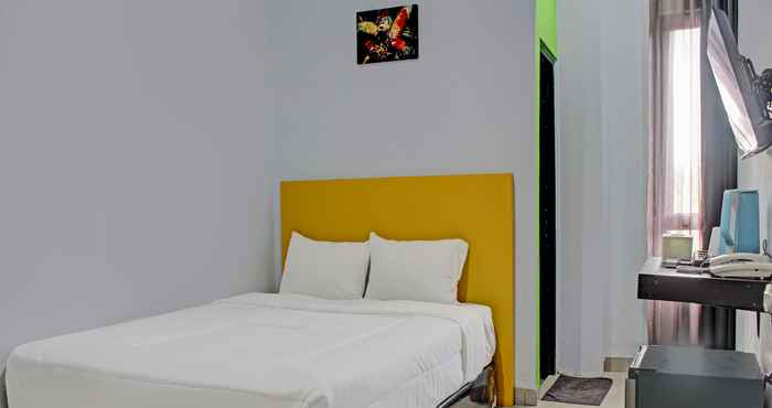 Kamar Tidur Capital O 92583 Raja Soeta Hostel Syariah