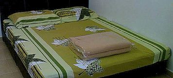Kamar Tidur 4 OYO 90786 Motel Merak