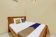 Kamar Tidur SPOT ON 92515 Timoti Guest House