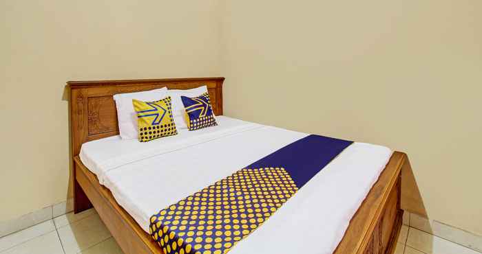 Kamar Tidur SPOT ON 92515 Timoti Guest House