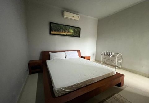 Bedroom Hotel O Rosela House Syariah