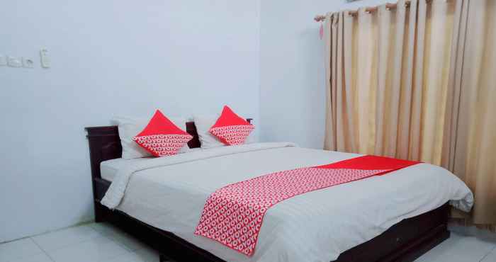 Kamar Tidur OYO 92561 Excellent Kost