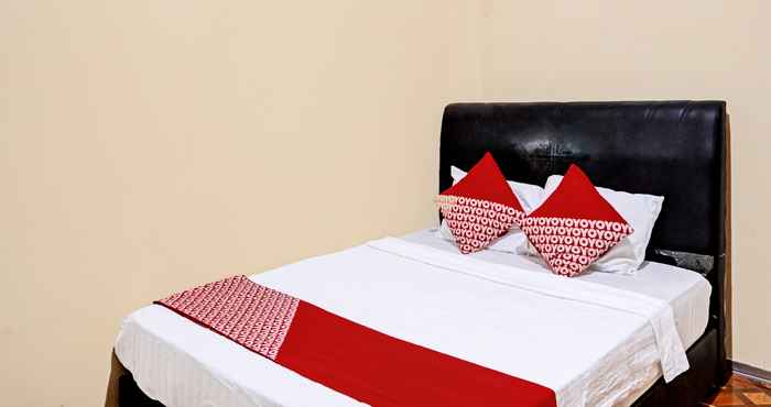 Kamar Tidur OYO 92553 Caitlin Homestay