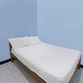 Bedroom 1 โรงแรมโอ จาติ โฮมสเตย์ ใกล้สวนสุรานาดี, โรงแรม & ที่พัก SMK PPN Mataram