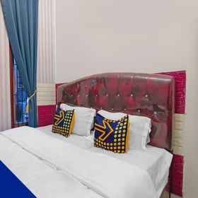 Bedroom 1 Hotel O Putri Guest House Syariah Near SPBU Rimbo Panjang, Giant Ekstra Tuanku Tambusai Hotels