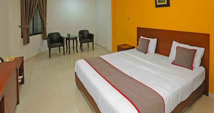 Kamar Tidur Townhouse OAK Hotel Fiducia Pasar Minggu