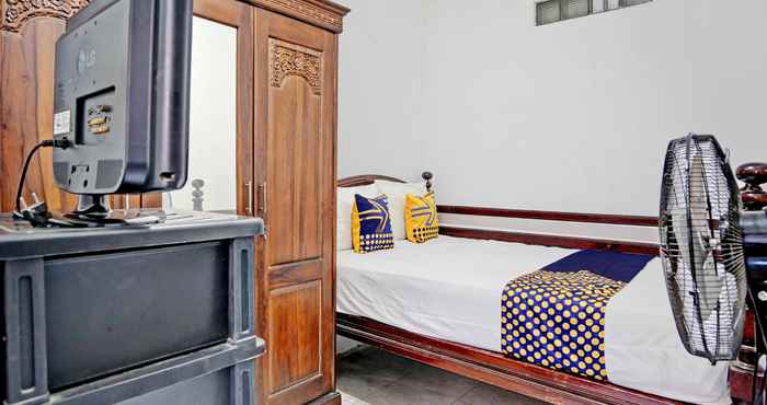 Bedroom SPOT ON 92595 Umi Homestay Syariah