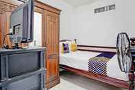 Bedroom SPOT ON 92595 Umi Homestay Syariah