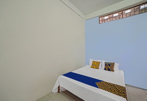 Phòng ngủ SPOT ON 92600 Mandiri Inn