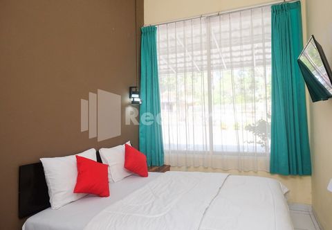 臥室 Travelista Homestay near GOR Candradimuka Semarang Mitra RedDoorz