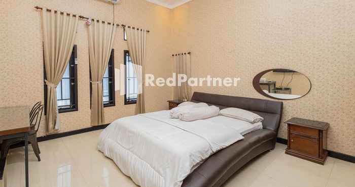 ห้องนอน Boss Residence Serang Mitra RedDoorz