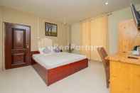 Bedroom Hotel Grand El-a Syariah Mitra RedDoorz