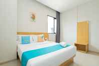 Bedroom Sans Hotel Bobosini Malang by RedDoorz