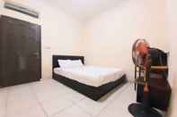 Phòng ngủ SPOT ON 92599 Pondok Anggrek Syariah