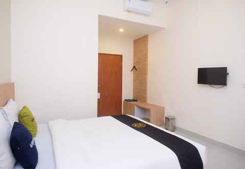 Bedroom Urbanview Hotel DJ Inn Tegal