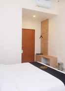 BEDROOM Urbanview Hotel DJ Inn Tegal